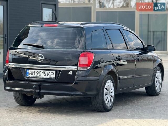 Черный Опель Астра, объемом двигателя 1.6 л и пробегом 258 тыс. км за 4499 $, фото 3 на Automoto.ua