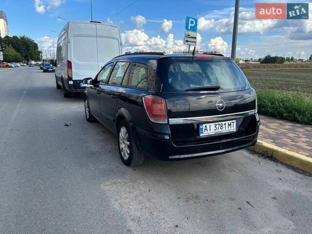 Черный Опель Астра, объемом двигателя 1.6 л и пробегом 350 тыс. км за 3500 $, фото 4 на Automoto.ua