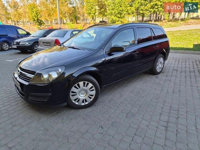 Черный Опель Астра, объемом двигателя 1.4 л и пробегом 214 тыс. км за 4400 $, фото 1 на Automoto.ua