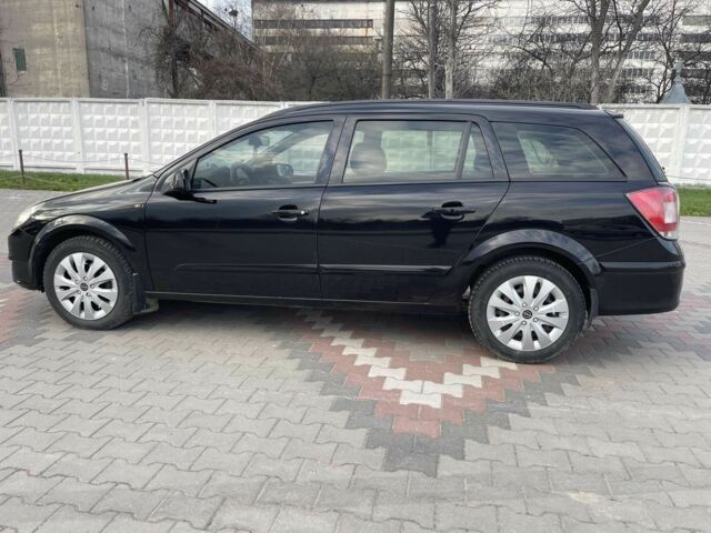 Черный Опель Астра, объемом двигателя 1.7 л и пробегом 250 тыс. км за 3950 $, фото 10 на Automoto.ua