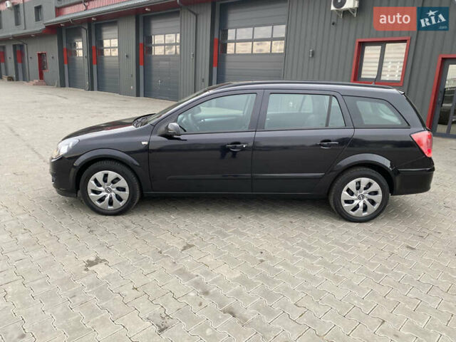 Черный Опель Астра, объемом двигателя 1.6 л и пробегом 231 тыс. км за 4800 $, фото 3 на Automoto.ua