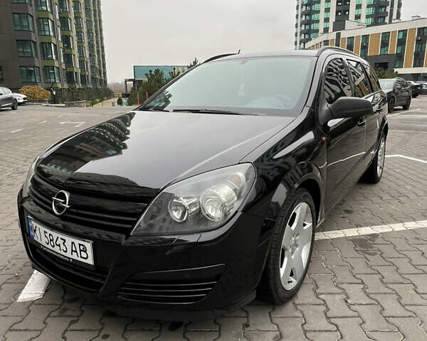 Черный Опель Астра, объемом двигателя 1.7 л и пробегом 330 тыс. км за 5200 $, фото 5 на Automoto.ua