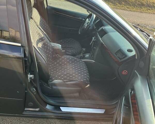 Черный Опель Астра, объемом двигателя 1.7 л и пробегом 440 тыс. км за 3150 $, фото 10 на Automoto.ua