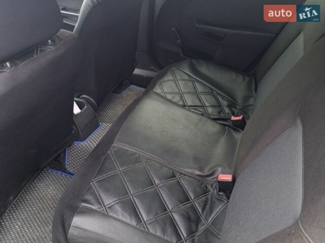 Черный Опель Астра, объемом двигателя 1.7 л и пробегом 268 тыс. км за 3600 $, фото 2 на Automoto.ua