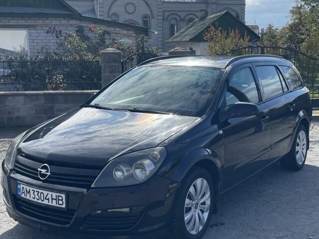 Черный Опель Астра, объемом двигателя 1.7 л и пробегом 320 тыс. км за 4250 $, фото 2 на Automoto.ua