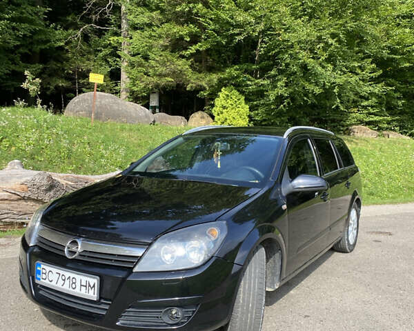 Черный Опель Астра, объемом двигателя 1.91 л и пробегом 295 тыс. км за 5200 $, фото 1 на Automoto.ua
