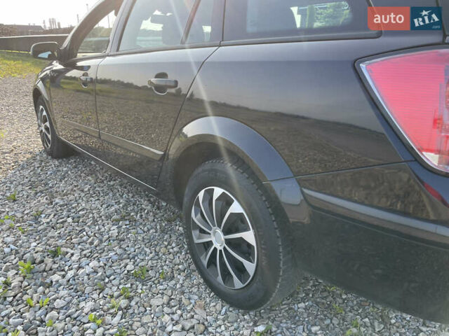 Черный Опель Астра, объемом двигателя 1.6 л и пробегом 192 тыс. км за 4650 $, фото 13 на Automoto.ua