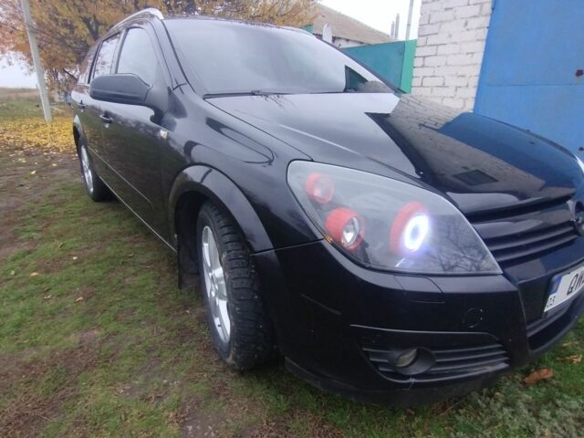 Черный Опель Астра, объемом двигателя 1.9 л и пробегом 320 тыс. км за 4999 $, фото 5 на Automoto.ua