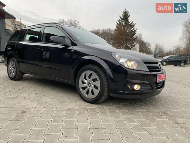 Черный Опель Астра, объемом двигателя 1.6 л и пробегом 231 тыс. км за 4800 $, фото 11 на Automoto.ua