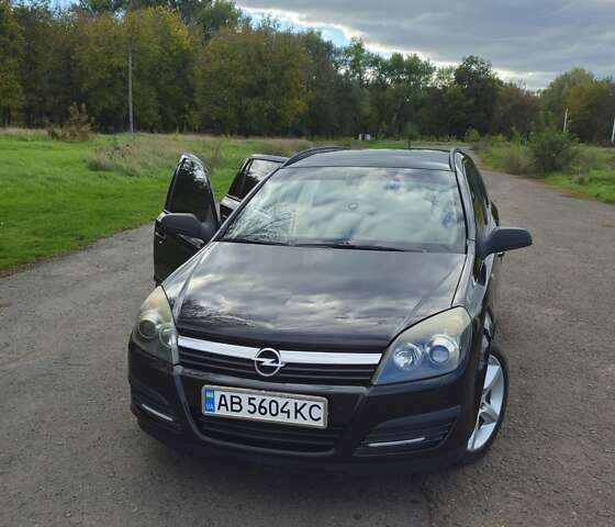 Черный Опель Астра, объемом двигателя 1.8 л и пробегом 260 тыс. км за 5200 $, фото 2 на Automoto.ua