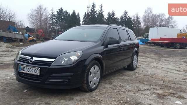 Черный Опель Астра, объемом двигателя 1.8 л и пробегом 260 тыс. км за 5200 $, фото 14 на Automoto.ua