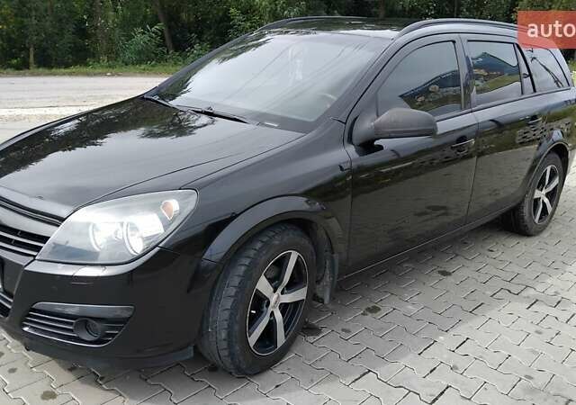 Чорний Опель Астра, об'ємом двигуна 1.2 л та пробігом 340 тис. км за 3900 $, фото 7 на Automoto.ua