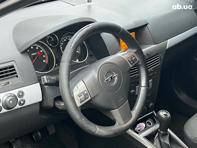 Черный Опель Астра, объемом двигателя 1.6 л и пробегом 340 тыс. км за 5140 $, фото 26 на Automoto.ua