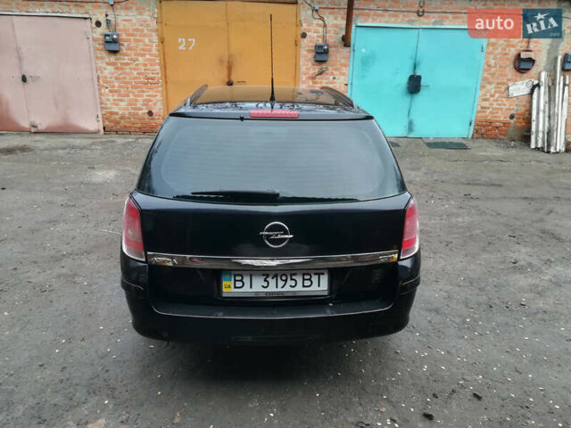 Черный Опель Астра, объемом двигателя 1.3 л и пробегом 163 тыс. км за 4900 $, фото 1 на Automoto.ua