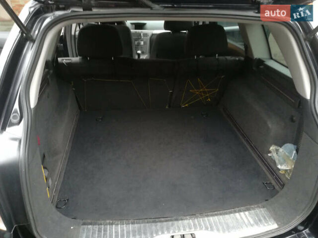 Черный Опель Астра, объемом двигателя 1.3 л и пробегом 163 тыс. км за 4900 $, фото 4 на Automoto.ua