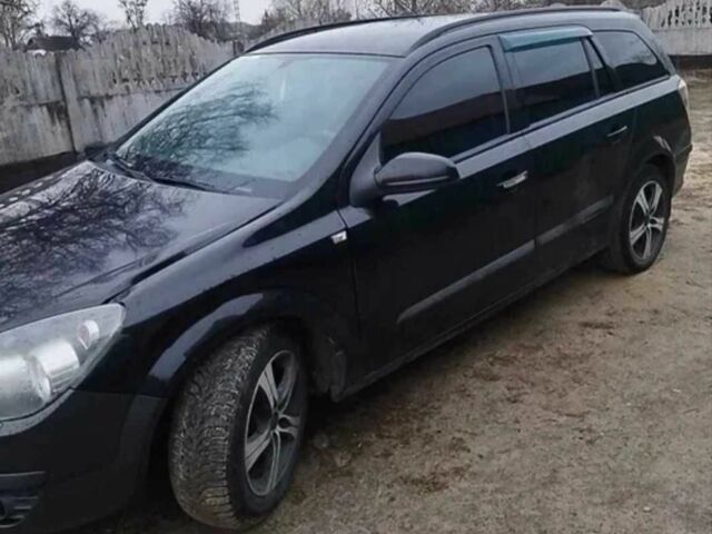 Черный Опель Астра, объемом двигателя 1.2 л и пробегом 340 тыс. км за 3200 $, фото 1 на Automoto.ua