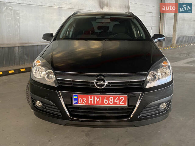 Черный Опель Астра, объемом двигателя 1.6 л и пробегом 207 тыс. км за 4999 $, фото 2 на Automoto.ua