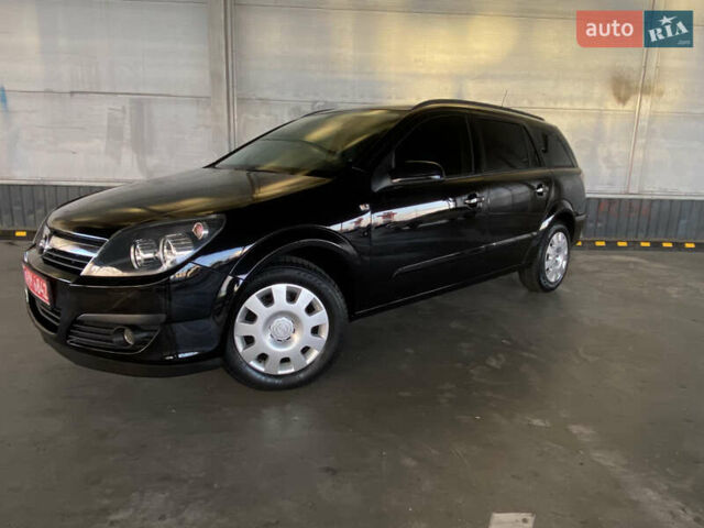 Черный Опель Астра, объемом двигателя 1.6 л и пробегом 207 тыс. км за 4999 $, фото 6 на Automoto.ua