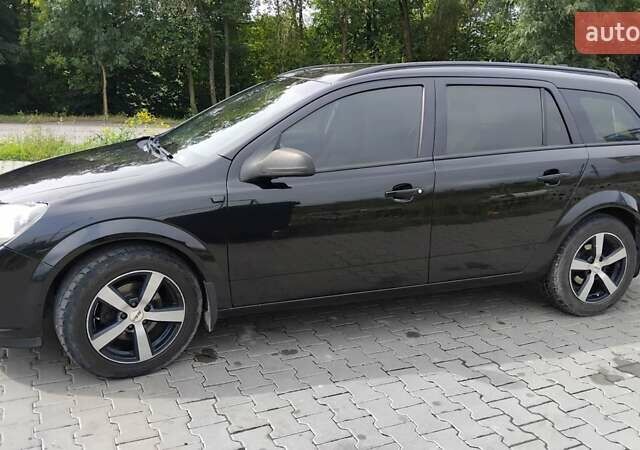 Чорний Опель Астра, об'ємом двигуна 1.2 л та пробігом 340 тис. км за 3900 $, фото 6 на Automoto.ua