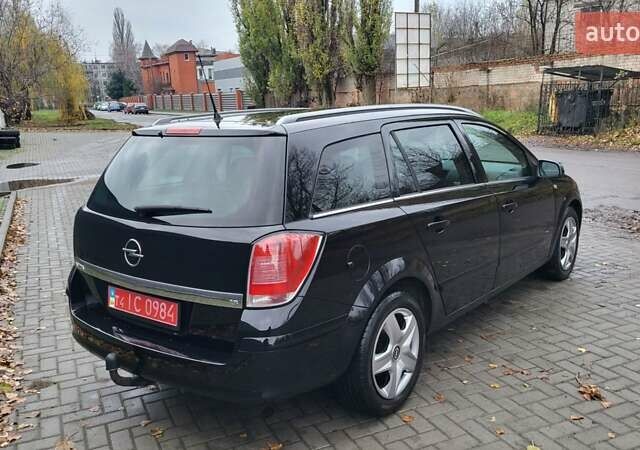 Черный Опель Астра, объемом двигателя 1.8 л и пробегом 165 тыс. км за 5650 $, фото 19 на Automoto.ua