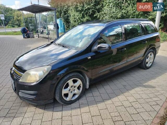 Черный Опель Астра, объемом двигателя 1.3 л и пробегом 268 тыс. км за 4550 $, фото 2 на Automoto.ua