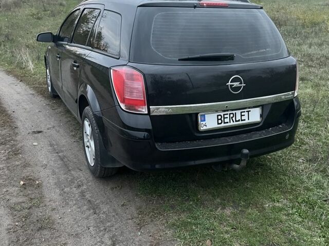 Черный Опель Астра, объемом двигателя 1.6 л и пробегом 330 тыс. км за 5200 $, фото 2 на Automoto.ua