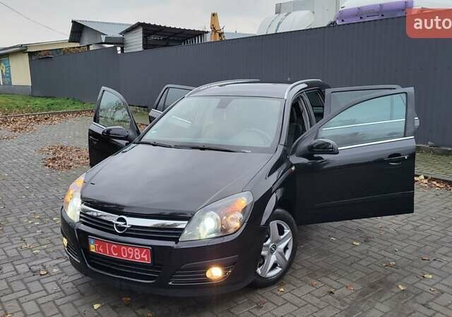 Черный Опель Астра, объемом двигателя 1.8 л и пробегом 165 тыс. км за 5650 $, фото 20 на Automoto.ua