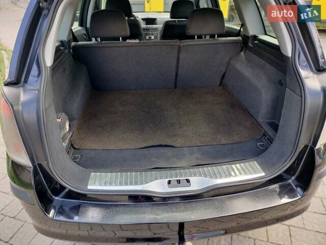 Черный Опель Астра, объемом двигателя 1.3 л и пробегом 268 тыс. км за 4550 $, фото 5 на Automoto.ua