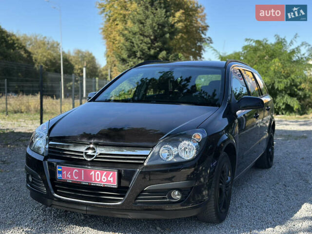 Черный Опель Астра, объемом двигателя 1.6 л и пробегом 241 тыс. км за 5700 $, фото 6 на Automoto.ua