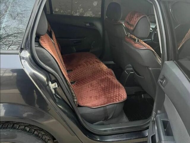 Черный Опель Астра, объемом двигателя 1.2 л и пробегом 300 тыс. км за 3400 $, фото 3 на Automoto.ua