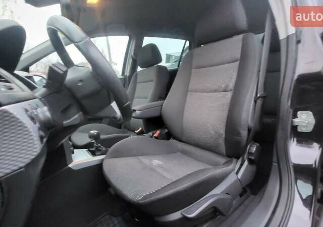 Черный Опель Астра, объемом двигателя 1.8 л и пробегом 165 тыс. км за 5650 $, фото 28 на Automoto.ua