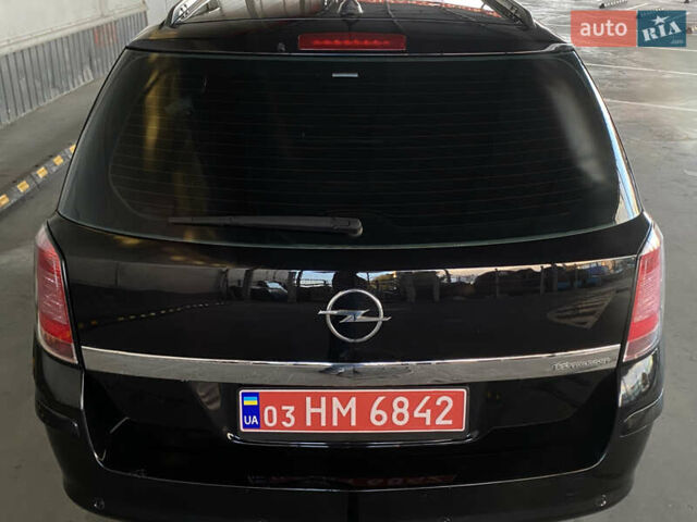 Черный Опель Астра, объемом двигателя 1.6 л и пробегом 207 тыс. км за 4999 $, фото 12 на Automoto.ua