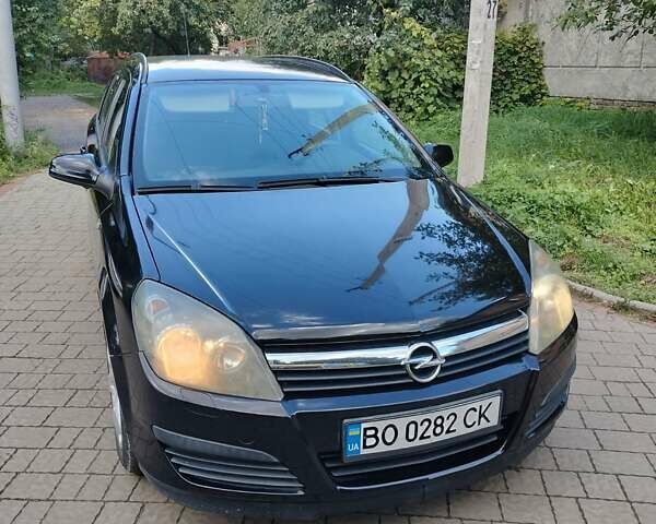 Черный Опель Астра, объемом двигателя 1.3 л и пробегом 268 тыс. км за 4550 $, фото 9 на Automoto.ua