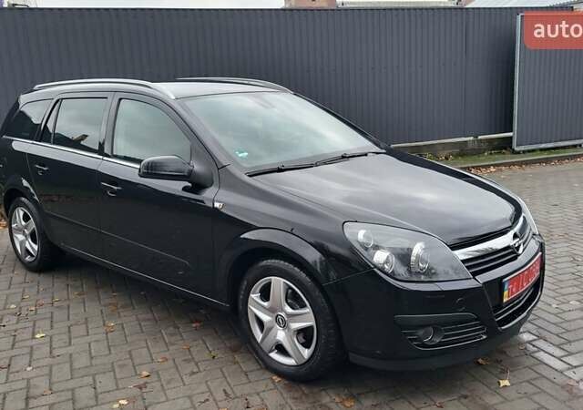 Черный Опель Астра, объемом двигателя 1.8 л и пробегом 165 тыс. км за 5650 $, фото 14 на Automoto.ua