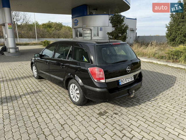 Черный Опель Астра, объемом двигателя 1.69 л и пробегом 420 тыс. км за 5500 $, фото 15 на Automoto.ua