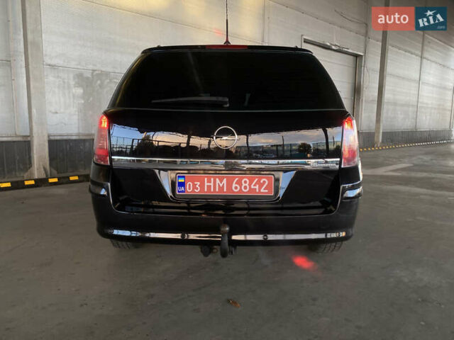 Черный Опель Астра, объемом двигателя 1.6 л и пробегом 207 тыс. км за 4999 $, фото 13 на Automoto.ua