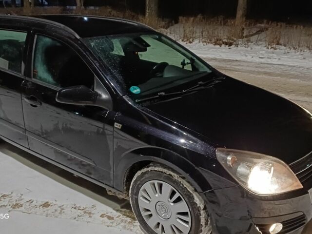 Черный Опель Астра, объемом двигателя 1.6 л и пробегом 243 тыс. км за 5498 $, фото 11 на Automoto.ua