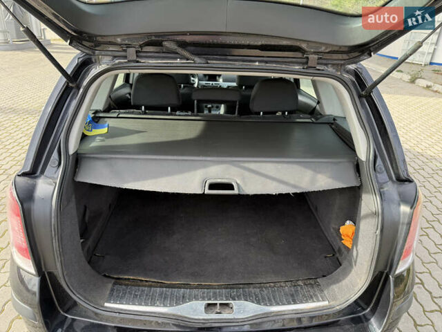 Черный Опель Астра, объемом двигателя 1.69 л и пробегом 420 тыс. км за 5500 $, фото 18 на Automoto.ua