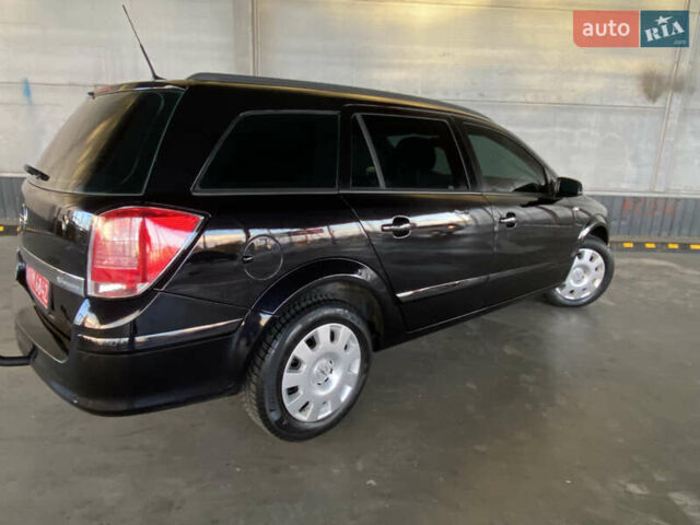 Черный Опель Астра, объемом двигателя 1.6 л и пробегом 207 тыс. км за 4999 $, фото 9 на Automoto.ua