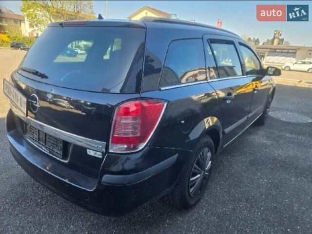 Черный Опель Астра, объемом двигателя 1.8 л и пробегом 223 тыс. км за 6500 $, фото 5 на Automoto.ua