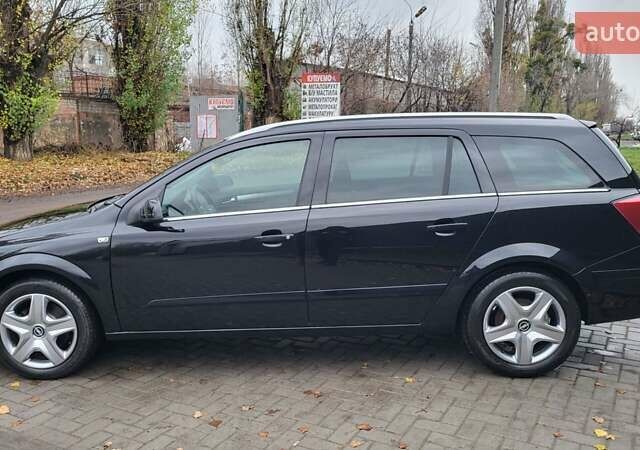 Черный Опель Астра, объемом двигателя 1.8 л и пробегом 165 тыс. км за 5650 $, фото 8 на Automoto.ua