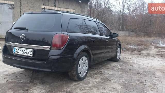 Черный Опель Астра, объемом двигателя 1.8 л и пробегом 260 тыс. км за 5200 $, фото 29 на Automoto.ua