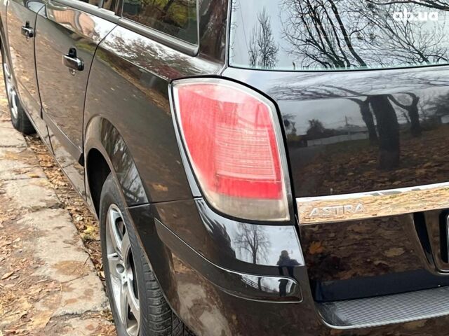 Черный Опель Астра, объемом двигателя 1.6 л и пробегом 340 тыс. км за 5140 $, фото 9 на Automoto.ua