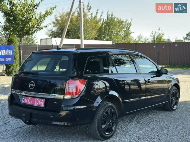 Черный Опель Астра, объемом двигателя 1.6 л и пробегом 241 тыс. км за 5700 $, фото 13 на Automoto.ua