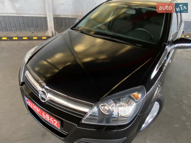 Черный Опель Астра, объемом двигателя 1.6 л и пробегом 207 тыс. км за 4999 $, фото 5 на Automoto.ua