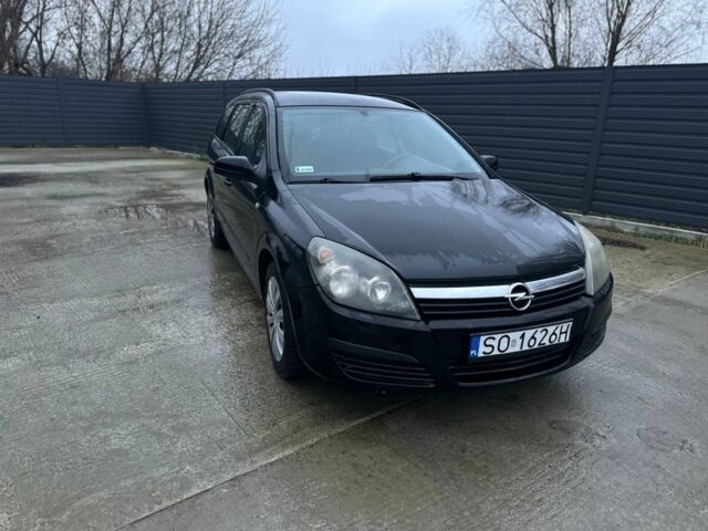 Черный Опель Астра, объемом двигателя 1.9 л и пробегом 300 тыс. км за 2500 $, фото 1 на Automoto.ua