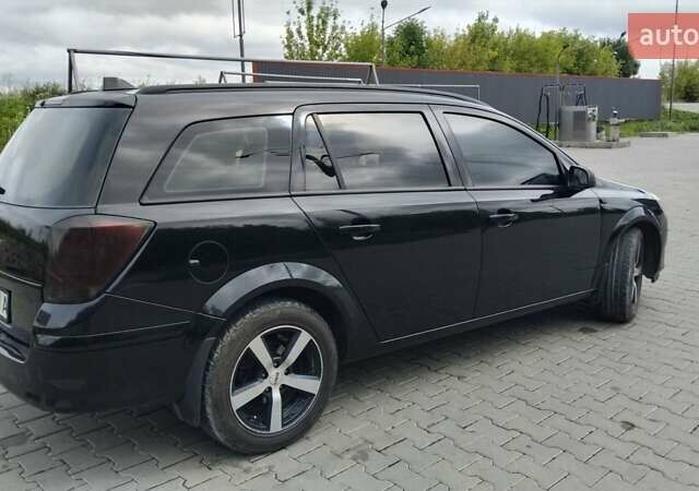 Чорний Опель Астра, об'ємом двигуна 1.2 л та пробігом 340 тис. км за 3900 $, фото 5 на Automoto.ua