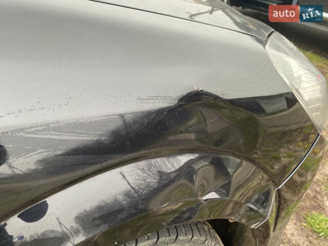 Черный Опель Астра, объемом двигателя 1.6 л и пробегом 270 тыс. км за 4200 $, фото 6 на Automoto.ua