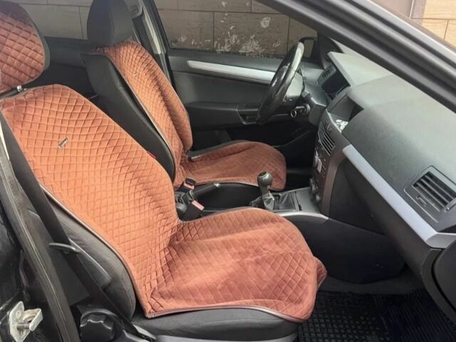 Черный Опель Астра, объемом двигателя 1.2 л и пробегом 300 тыс. км за 3400 $, фото 6 на Automoto.ua