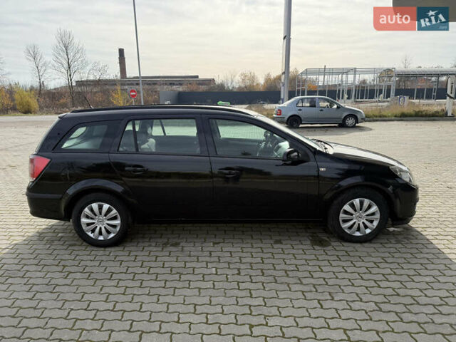 Черный Опель Астра, объемом двигателя 1.69 л и пробегом 420 тыс. км за 5500 $, фото 12 на Automoto.ua